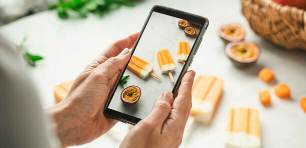 How To Make Money On Tiktok A Beginners Guide image 5 tiktoker taking photos of ice lollies for their content make xtra money online