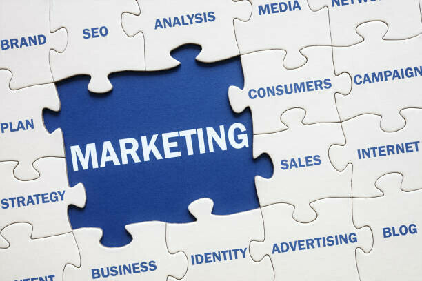 A Step-by-Step Guide To Starting A Profitable Blog image 3 jigsaw pieces with a variety of key marketing terms marketing being highlighted make xtra money online