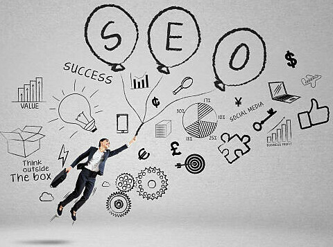 Understanding The Power Of SEO In Affiliate Marketing image 1 balloons spelling out SEO lifting a man with words success value social media makextramoneyonline