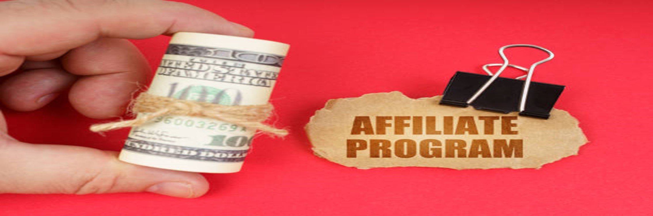 Finding-The-Best-Affiliate-Programs-For-Your-Niche-featured-image-637x1920w-sign-with-affiliate-program-written-on-it-held-by-a-bulldog-clip-with-a-roll-of-dollar-bills-make-xtra-money-online